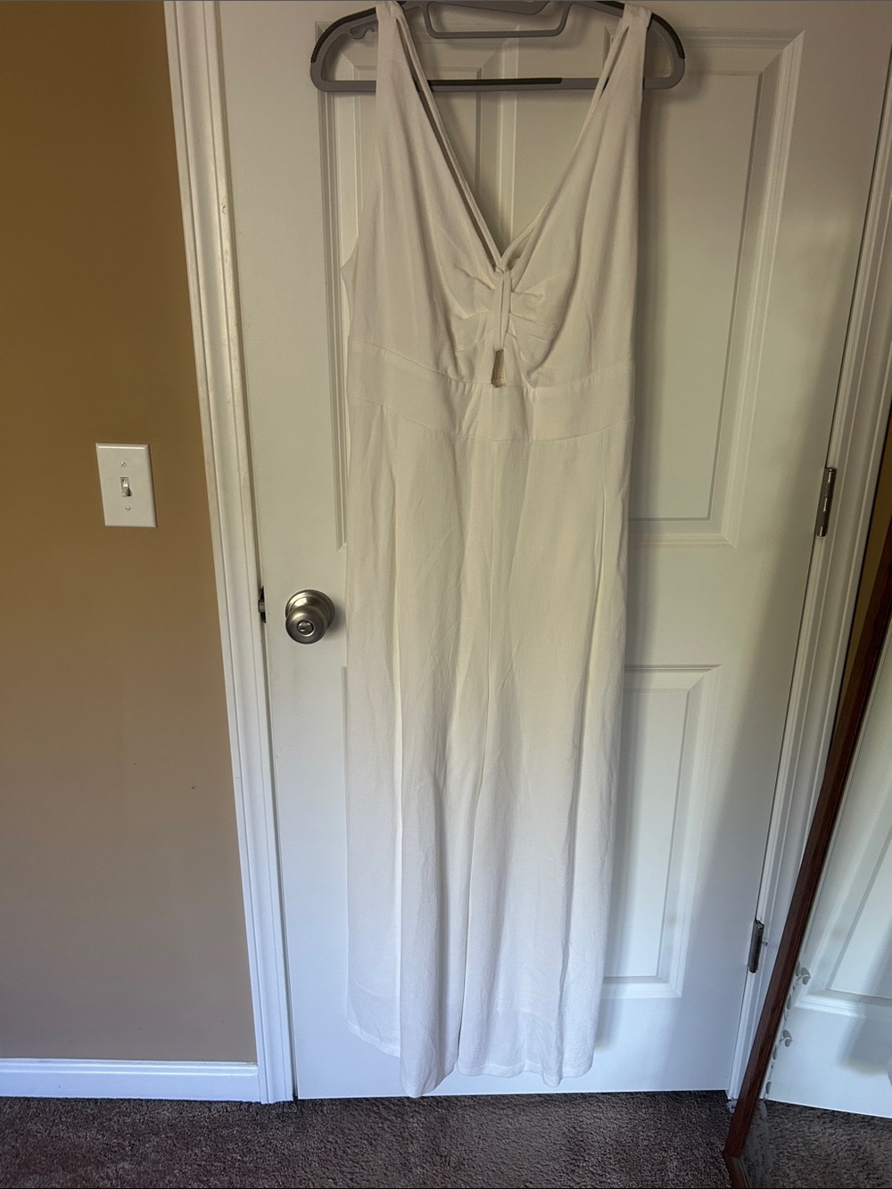 Cream Sleeveless V-Neck Jumpsuit with Front Tie